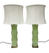 Pair of table lamps in the form of bamboo upon a square base