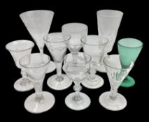 Three mid 18th century wine glasses