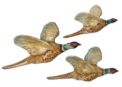 Set of three Beswick pheasant graduated wall plaques