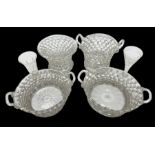 Pair of 19th century Lieges trailed glass openwork baskets of oval form with wrythen loop handles