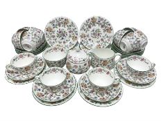 Minton Haddon Hall pattern tea wares comprising twelve teacup trios