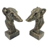 Pair of bronzed cast iron greyhound busts on plinths