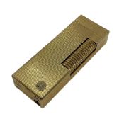 Dunhill gold plated lighter with engine turned decoration