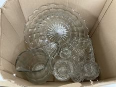 Large glass jug and bowl together with glass dressing table set to include lidded jars