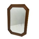 Edwardian oak framed octagonal wall mirror