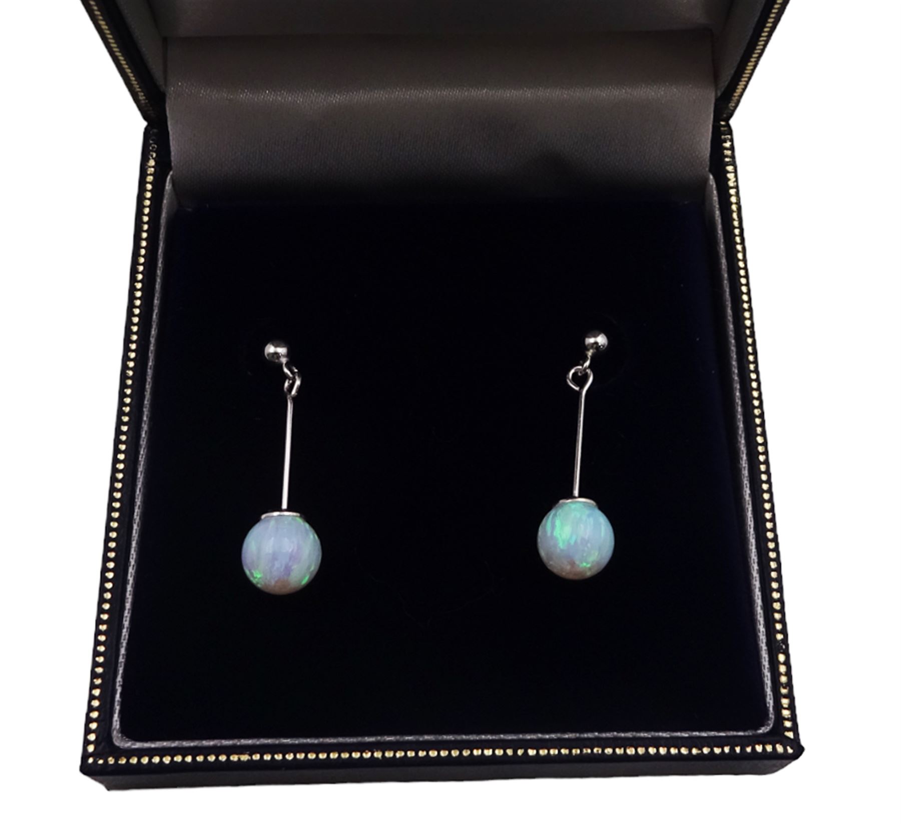 Pair of silver opal pendant stud earrings