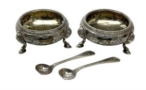 Pair of Victorian silver table salt cellars of cauldron form with gilt interiors