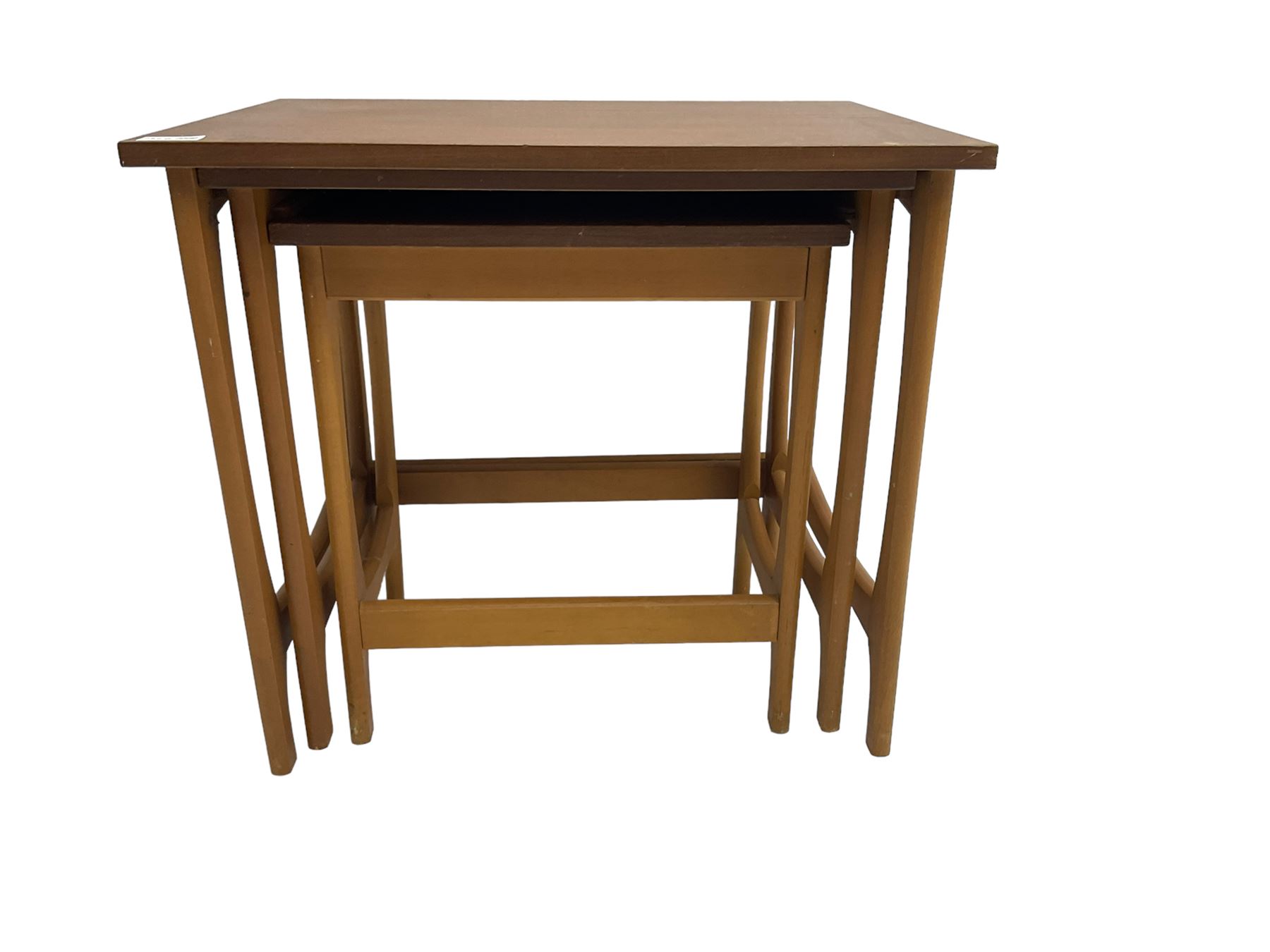 Mid-to late 20th century teak nest of three tables