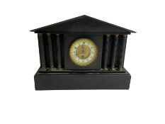 French - 19th-century timepiece mantle clock in a slate case with recessed columns. With pendulum an