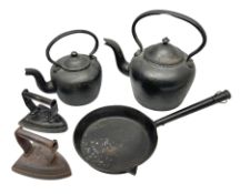 Two cast iron kettles to include Kenrick & Sobs 8 Pints example