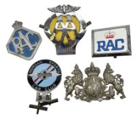 Four car badges