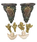 Pair of painted plaster wall brackets