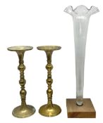 Pair of tall brass candlesticks