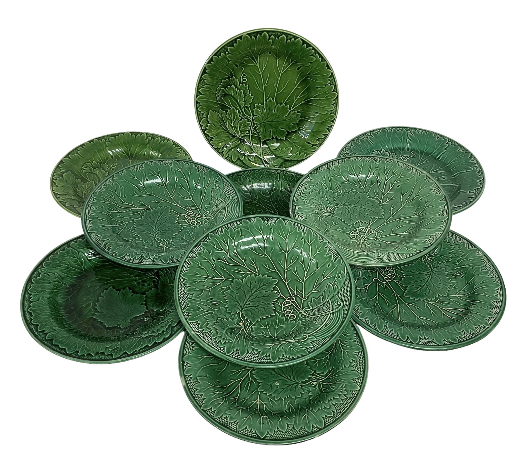 Ten majolica leaf design plates