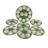 Set of six Chantilly France majolica style oyster plates and further larger serving dish