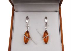 Pair of silver Baltic amber pendant stud earrings