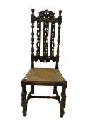 Late 19th century heavily carved oak hall chair