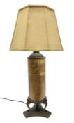 Table lamp of cylindrical form with cast metal mounts and raised upon a trefoil base with fabric sha