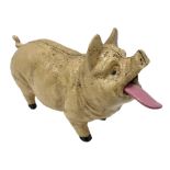 Cast iron mechanical money bank in the form of a pig