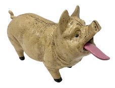 Cast iron mechanical money bank in the form of a pig