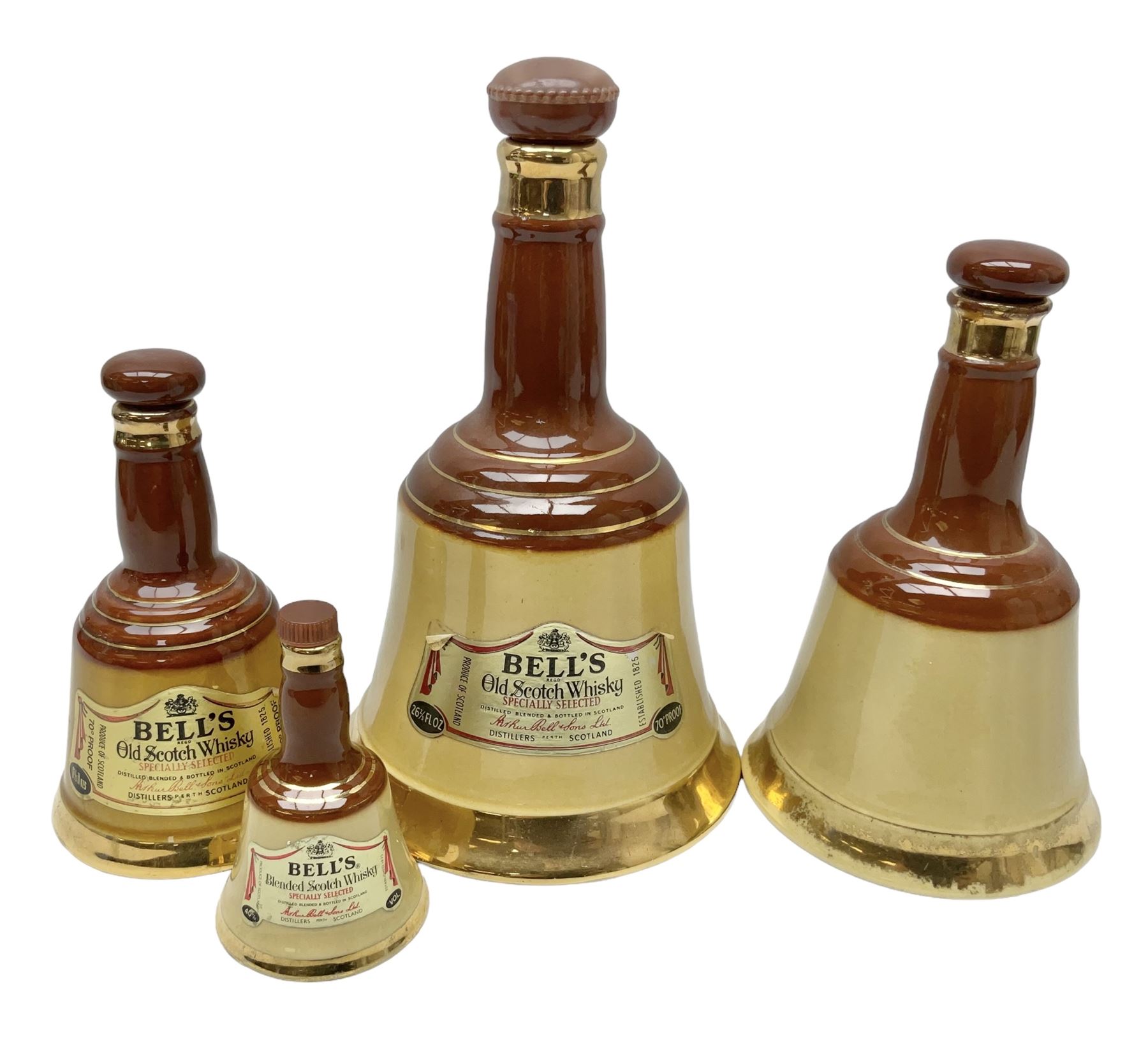 Wade Bells whisky decanters of graduating form