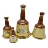 Wade Bells whisky decanters of graduating form