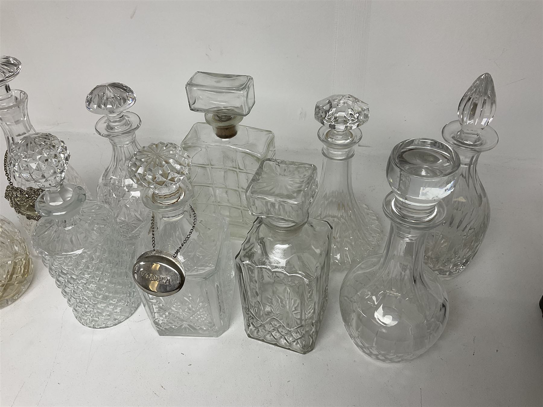 Ten decanters to include an I.W. Harper example of concave square form and two examples with tags - Image 4 of 4
