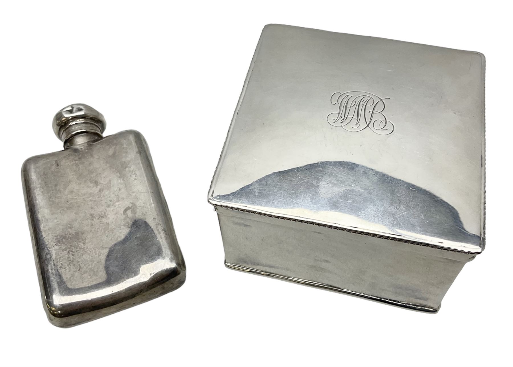 Small silver screw cap hip flask