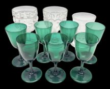 Seven 19th century green wine glasses