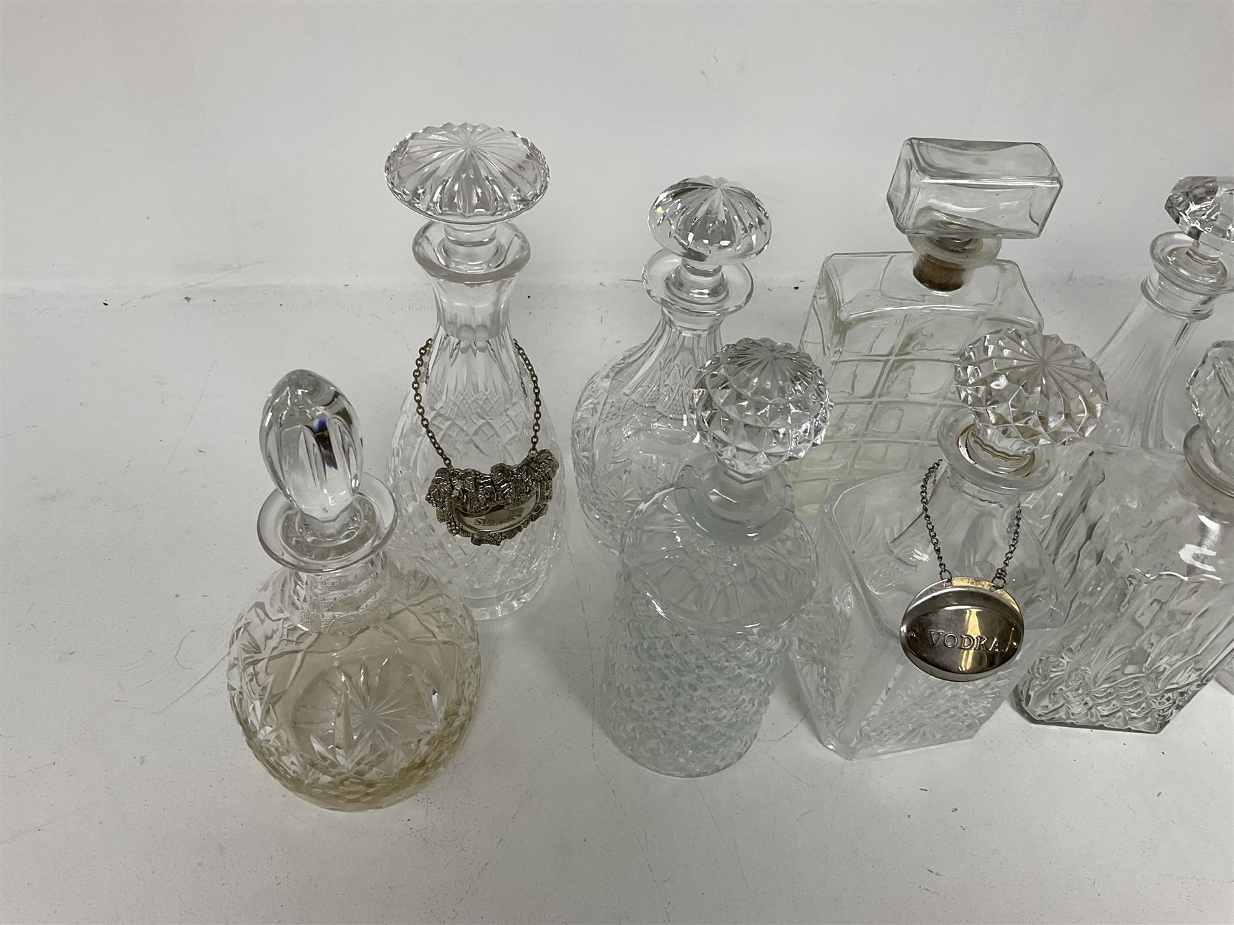 Ten decanters to include an I.W. Harper example of concave square form and two examples with tags - Image 2 of 4