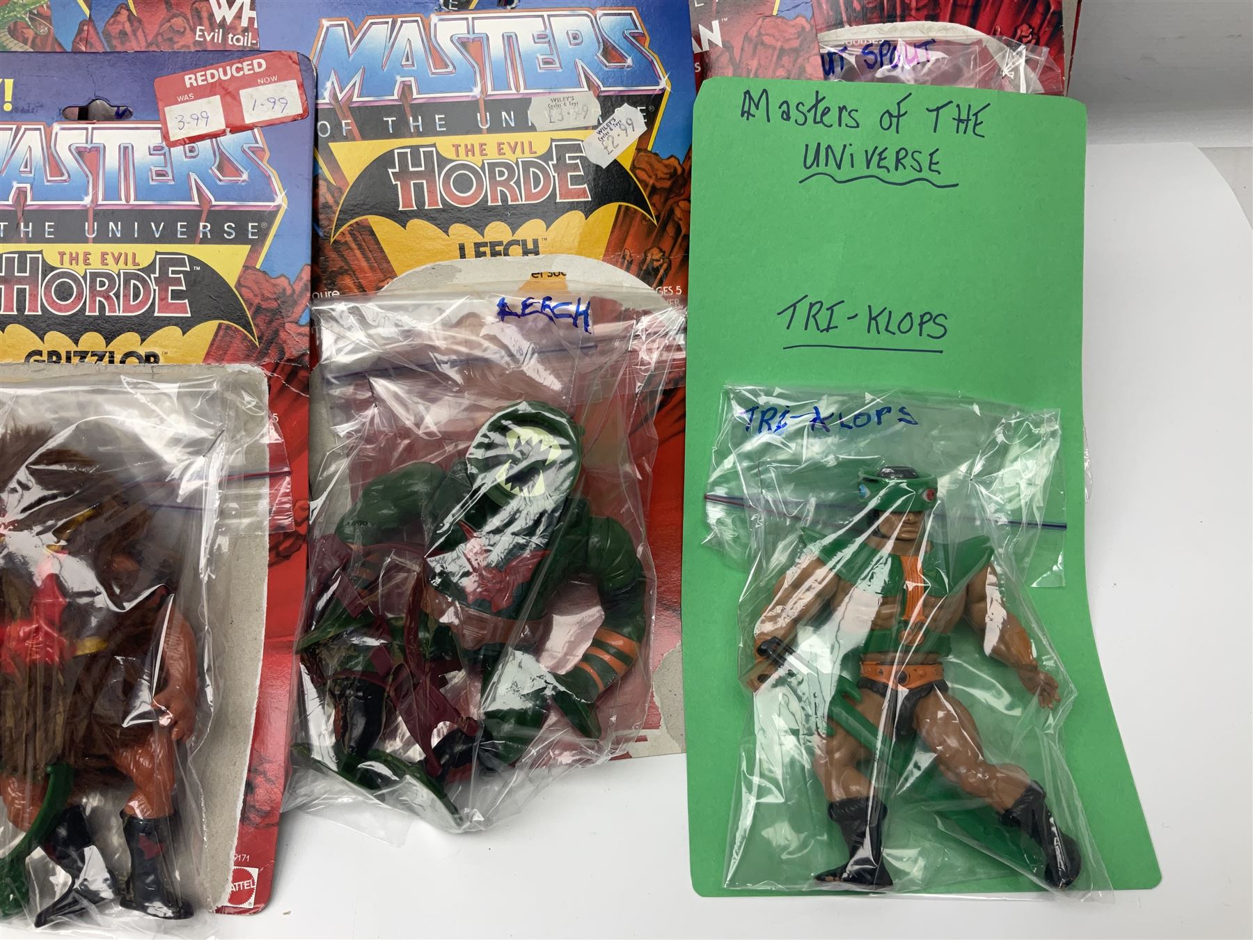 Thirty-one Masters of the Universe He-Man figures re-bagged on original backing cards; two others l - Image 11 of 19