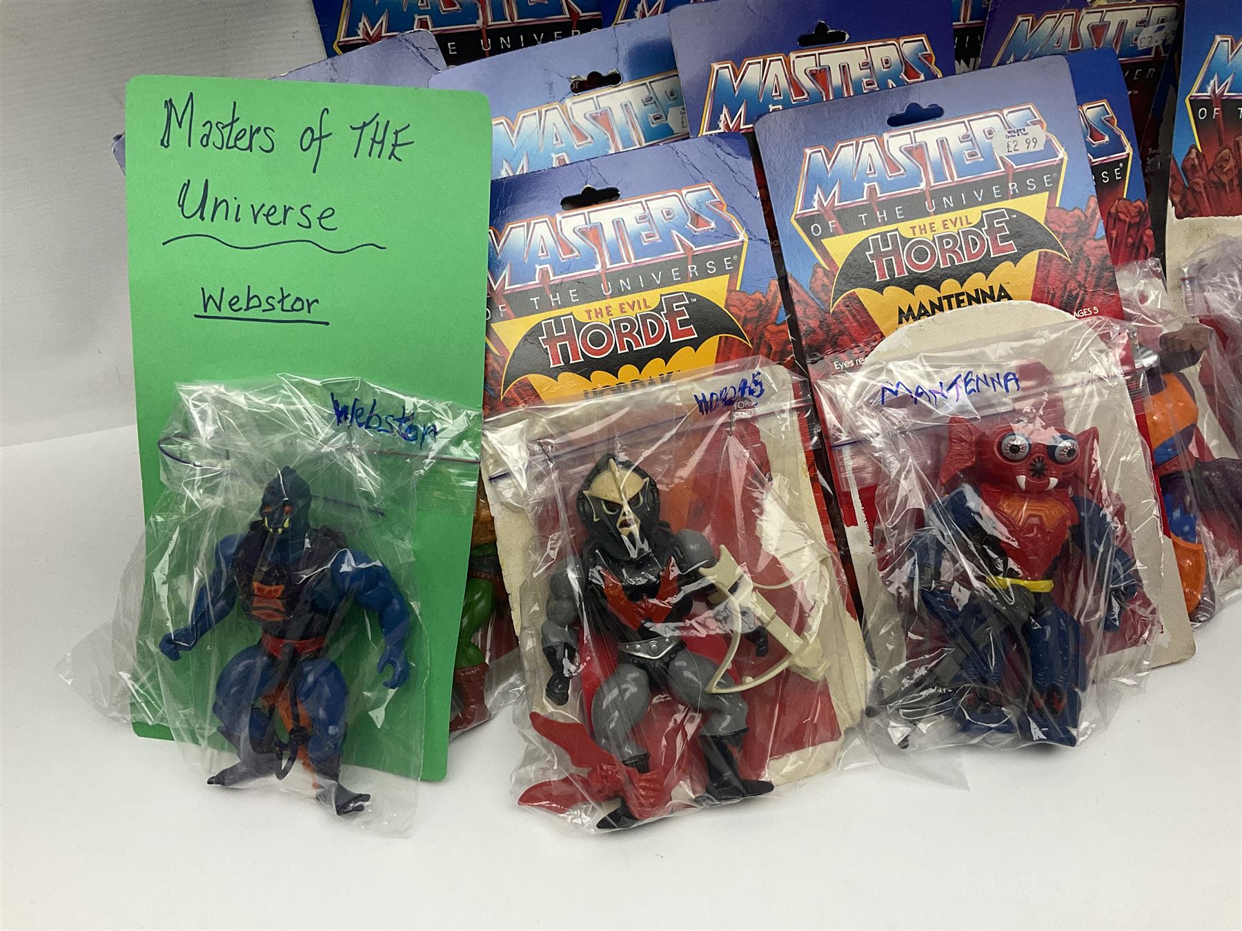 Thirty-one Masters of the Universe He-Man figures re-bagged on original backing cards; two others l - Image 15 of 19