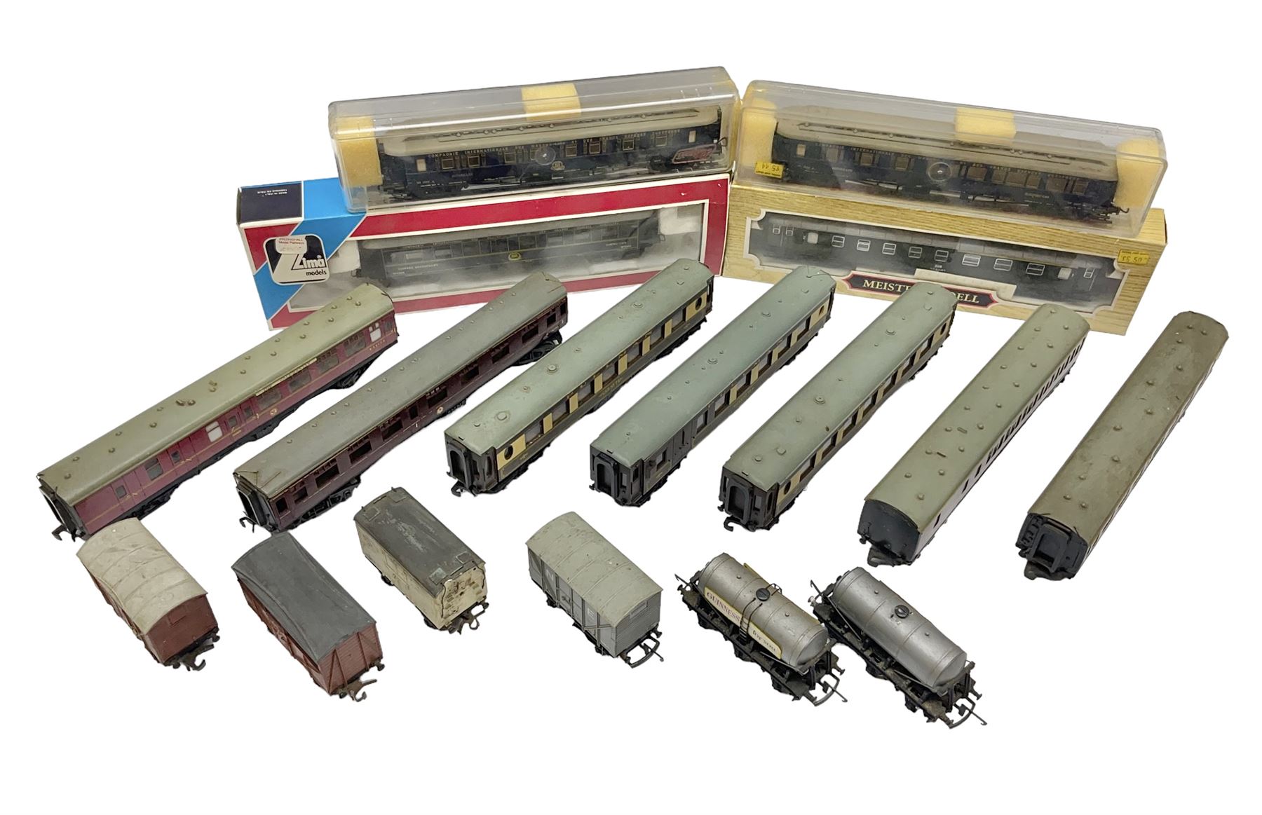 '00' gauge - four boxed and seven unboxed passenger coaches by Hornby Dublo