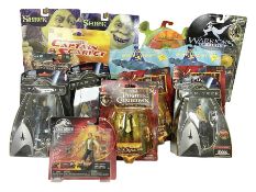 Seventeen TV & film related carded action figures comprising four Pirates of the Caribbean; five Shr