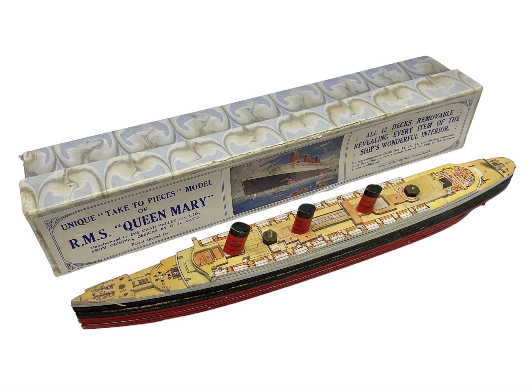 Chad Valley 'Take to Pieces' model of R.M.S. Queen Mary; made up of thirteen removable decks reveali