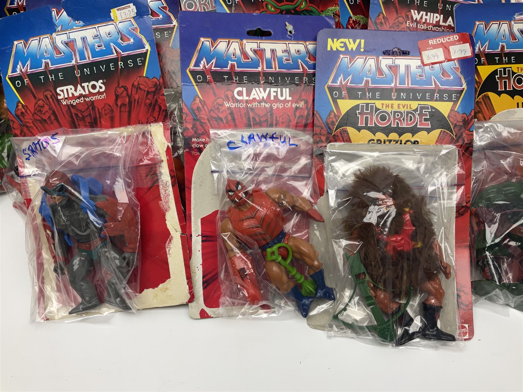 Thirty-one Masters of the Universe He-Man figures re-bagged on original backing cards; two others l - Image 12 of 19