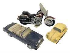 Franklin Mint - three die-cast models comprising 1:10 scale Harley Davidson Heritage Softail motorcy