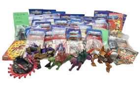 Thirty-one Masters of the Universe He-Man figures re-bagged on original backing cards; two others l
