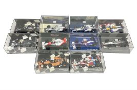 Pauls Model Art Minichamps Formula - ten 1:43 scale die-cast models of racing cars in plastic displa