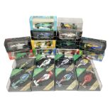 Eight Heritage Formula 1 die-cast models of racing cars in plastic display boxes; and twelve Onyx mo