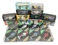 Eight Heritage Formula 1 die-cast models of racing cars in plastic display boxes; and twelve Onyx mo
