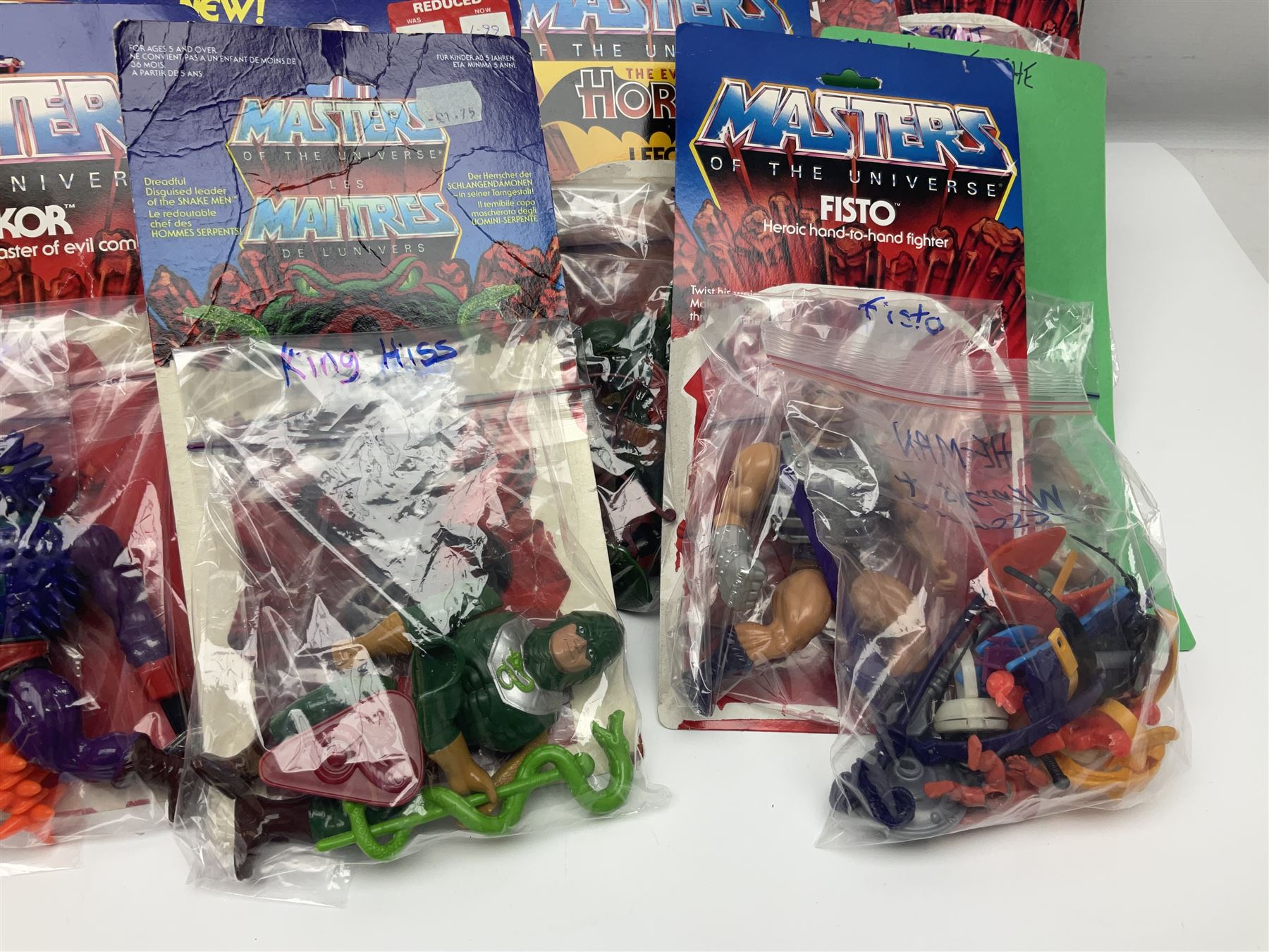 Thirty-one Masters of the Universe He-Man figures re-bagged on original backing cards; two others l - Image 10 of 19