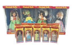 Four Mayfair Products Musical Dolls of Many Lands; original boxes and delivery boxes; and set of twe