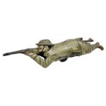 Einfalt (Germany) lithographed tin-plate clockwork figure of a soldier depicted lying on the ground