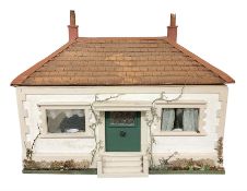 Scratch-built wooden dolls house as a double fronted single storey bungalow with stucco walls and wi