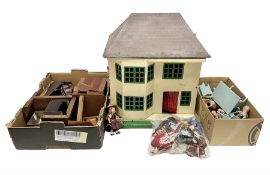 Mid-20th century Tri-ang wooden dolls house of bay-windowed form with hipped roof