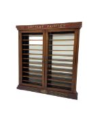 Modern hardwood display cabinet for model railway locomotives inscribed 'Gresley Pacifics' to the fr