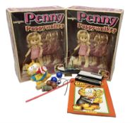 Two boxed Bradgate Penny Puppywalker dolls; Garfield soft toy and Panini sticker album; boxed Stylop