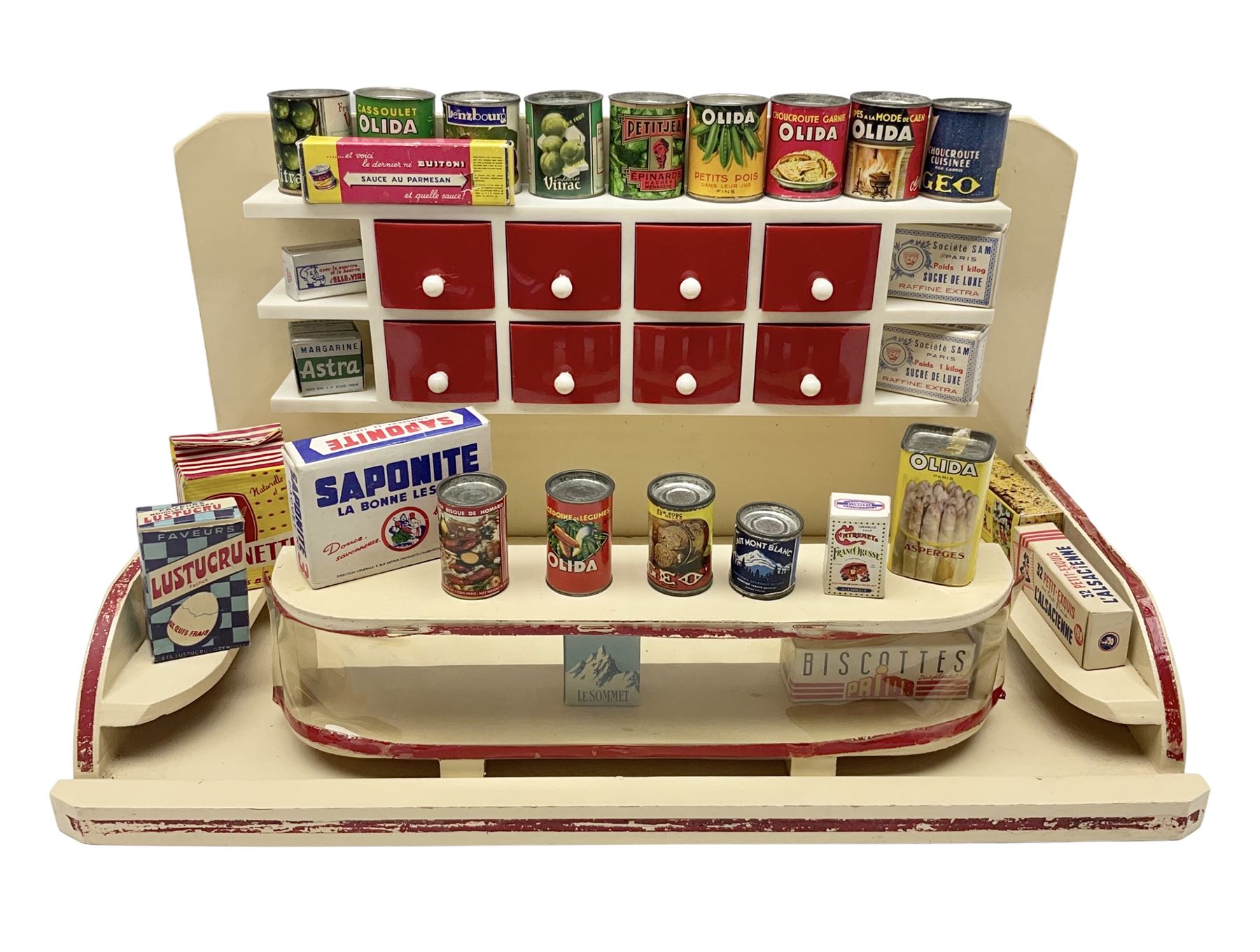 Late 1950s continental red and white painted wooden diorama of a grocery shop interior with fitted s