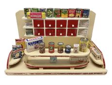 Late 1950s continental red and white painted wooden diorama of a grocery shop interior with fitted s